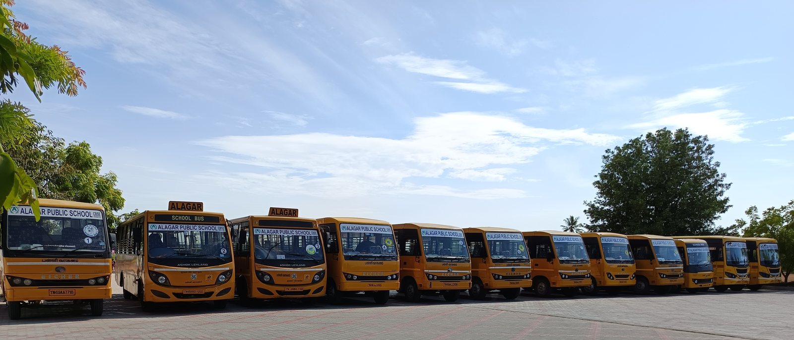 Alagar Public School bus fleet — GPS-tracked and CCTV-equipped